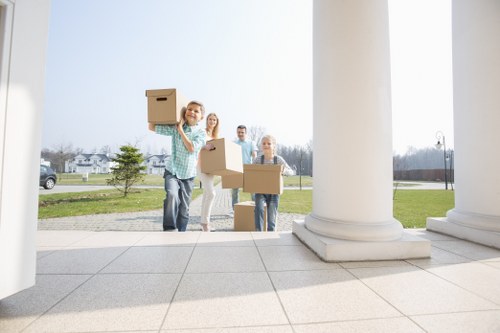 Professional movers handling a removal van service in Colindale