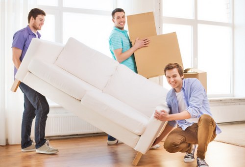 Apartment furniture being loaded for a short notice move in Colindale