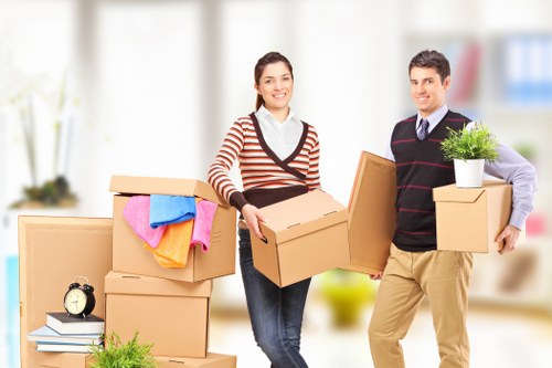 Packing boxes and furniture prepared for relocation services