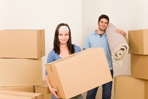 Home moving boxes organised by room in Colindale