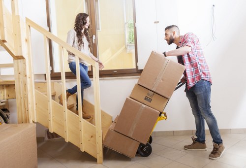 Business movers handling office equipment and furniture in Colindale