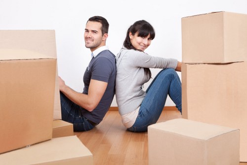 Removalists in Colindale preparing household items for safe transport