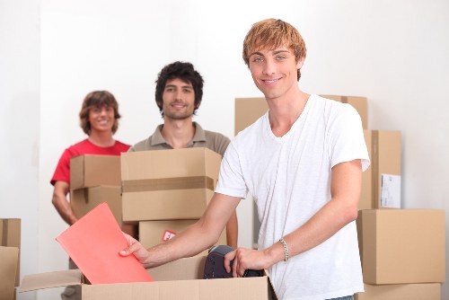 Office relocation equipment and moving crates arranged in Colindale