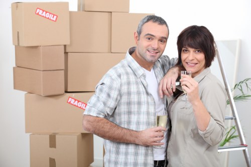 Packed office equipment and furniture ready for secure transport