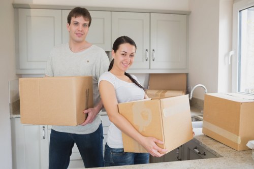 Packed boxes and furniture ready for urgent removals in Colindale